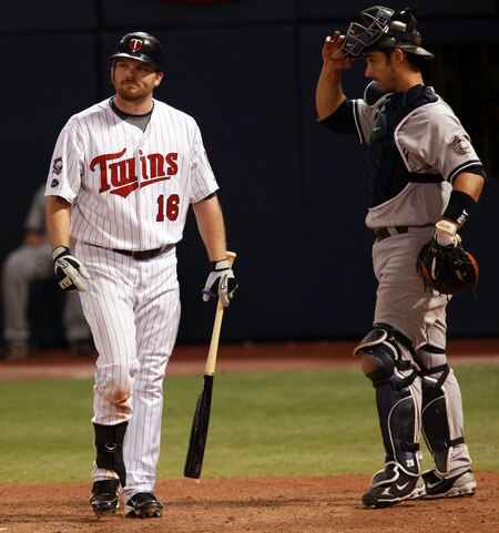 MINNEAPOLIS, MN - OCTOBER 11: Jason Kubel #16 of the Minnesota Twins walks away from home plate after being struck out in the ninth inning by New York Yankees closer Mariano Rivera in Game Three of the ALDS during the 2009 MLB Playoffs at the Hubert H. Humphrey Metrodome on October 11, 2009 in Minneapolis, Minnesota. The Yankees defeated the Twins 4-1. <br /><br /><span class="help">(Photo by Genevieve Ross/Getty Images)</span>