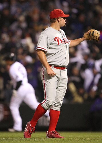 DENVER - OCTOBER 11:  Joe Blanton #56  (R) of the Philadelphia Phillies reacts after giving up a game tying home run to Carlos Gonzalez #5 (L) of the Colorado Rockies in the bottom of the fourth inning in Game Three of the NLDS during the 2009 MLB Playoffs at Coors Field on October 11, 2009 in Denver, Colorado. <br /><br /><span class="help">(Photo by Jed Jacobsohn/Getty Images)</span>