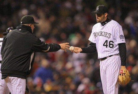DENVER - OCTOBER 11:  Jason Hammel #46 of the Colorado Rockies gives the ball to manager Jim Tracy #4 after giving up three runs against the Philadelphia Phillies in Game Three of the NLDS during the 2009 MLB Playoffs at Coors Field on October 11, 2009 in Denver, Colorado.  <br /><br /><span class="help">(Photo by Doug Pensinger/ Getty Images)</span>