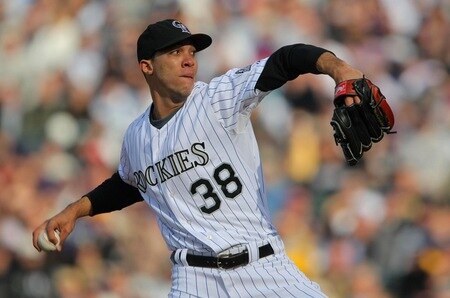 DENVER - OCTOBER 11:  Ubaldo Jimenez #38 of the Colorado Rockies pitches against the Philadelphia Phillies in Game Four of the NLDS during the 2009 MLB Playoffs at Coors Field on October 12, 2009 in Denver, Colorado.  <br /><br /><span class="help">(Photo by Doug Pensinger/ Getty Images)</span>