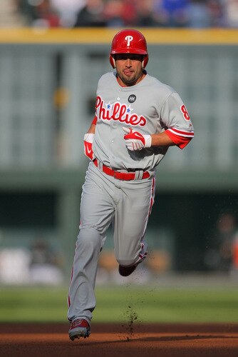 DENVER - OCTOBER 11:  Shane Victorino #8 of the Philadelphia Phillies rounds the bases after hitting a solo home run in the top of the first inning against the Colorado Rockies in Game Four of the NLDS during the 2009 MLB Playoffs at Coors Field on October 12, 2009 in Denver, Colorado. <br /><br /><span class="help">(Photo by Doug Pensinger/Getty Images)</span>