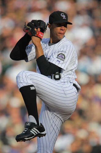 DENVER - OCTOBER 11:  Ubaldo Jimenez #38 of the Colorado Rockies pitches against the Philadelphia Phillies in Game Four of the NLDS during the 2009 MLB Playoffs at Coors Field on October 12, 2009 in Denver, Colorado.  <br /><br /><span class="help">(Photo by Doug Pensinger/ Getty Images)</span>