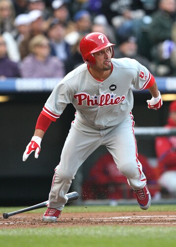 DENVER - OCTOBER 12:  Shane Victorino #8 of the Philadelphia Phillies hits a solo home run in the top of the first inning against the Colorado Rockies in Game Four of the NLDS during the 2009 MLB Playoffs at Coors Field on October 12, 2009 in Denver, Colorado. <br /><br /><span class="help">(Photo by Jed Jacobsohn/Getty Images)</span>