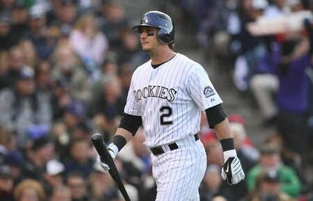 DENVER - OCTOBER 11:  Troy Tulowitzki #2 of the Colorado Rockies reacts as he walks to the dugout after striking out in the first inning against the Philadelphia Phillies in Game Four of the NLDS during the 2009 MLB Playoffs at Coors Field on October 12, 2009 in Denver, Colorado.  <br /><br /><span class="help">(Photo by Jed Jacobsohn/ Getty Images)</span>
