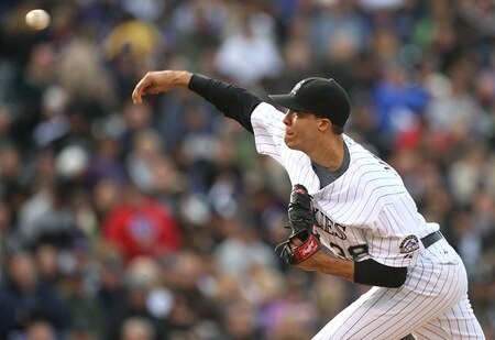 DENVER - OCTOBER 11:  Ubaldo Jimenez #38 of the Colorado Rockies pitches against the Philadelphia Phillies in Game Four of the NLDS during the 2009 MLB Playoffs at Coors Field on October 12, 2009 in Denver, Colorado.  <br /><br /><span class="help">(Photo by Jed Jacobsohn/ Getty Images)</span>