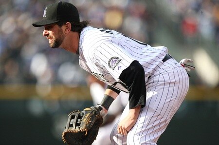DENVER - OCTOBER 11:  Todd Helton #17 of the Colorado Rockies fields against the Philadelphia Phillies in Game Four of the NLDS during the 2009 MLB Playoffs at Coors Field on October 12, 2009 in Denver, Colorado.  <br /><br /><span class="help">(Photo by Jed Jacobsohn/ Getty Images)</span>