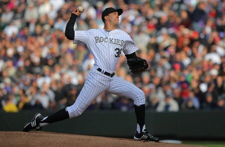 DENVER - OCTOBER 11:  Ubaldo Jimenez #38 of the Colorado Rockies pitches against the Philadelphia Phillies in Game Four of the NLDS during the 2009 MLB Playoffs at Coors Field on October 12, 2009 in Denver, Colorado.  <br /><br /><span class="help">(Photo by Doug Pensinger/Getty Images)</span>