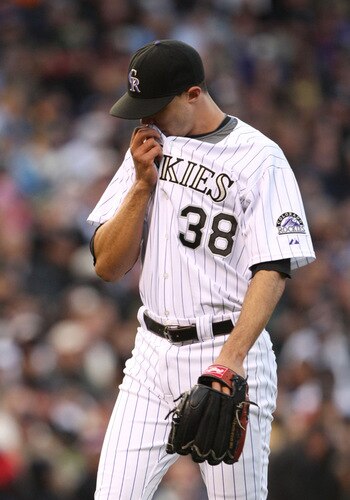 DENVER - OCTOBER 11:  Ubaldo Jimenez #38 of the Colorado Rockies reacts after giving up a solo home run to Jayson Werth of the Philadelphia Phillies in the sixth inning in Game Four of the NLDS during the 2009 MLB Playoffs at Coors Field on October 12, 2009 in Denver, Colorado.  <br /><br /><span class="help">(Photo by Doug Pensinger/Getty Images)</span>