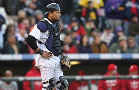 DENVER - OCTOBER 12:  Yorvit Torrealba #8 of the Colorado Rockies looks on against the Philadelphia Phillies in Game Four of the NLDS during the 2009 MLB Playoffs at Coors Field on October 12, 2009 in Denver, Colorado. <br /><br /><span class="help">(Photo by Jed Jacobsohn/Getty Images)</span>
