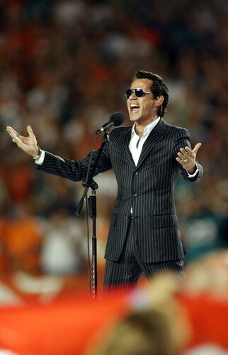 MIAMI - OCTOBER 12: Singer Marc Anthony sings the National Anthem prior to the Miami Dolphins against the New York Jets fans prior to their game at Land Shark Stadium on October 12, 2009 in Miami, Florida.  <br /><br /><span class="help">(Photo by Marc Serota/Getty Images)</span>