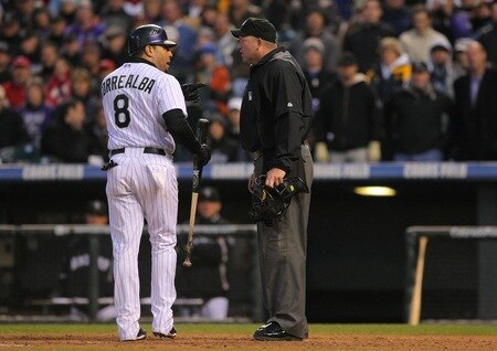DENVER - OCTOBER 12:  Yorvit Torrealba #8 of the Colorado Rockies voices his displeasure after being called out on strikes by home plate umpire Ron Kulpa #46 against the Philadelphia Phillies in the bottom of the seventh inning in Game Four of the NLDS during the 2009 MLB Playoffs at Coors Field on October 12, 2009 in Denver, Colorado.  <br /><br /><span class="help">(Photo by Doug Pensinger/Getty Images)</span>