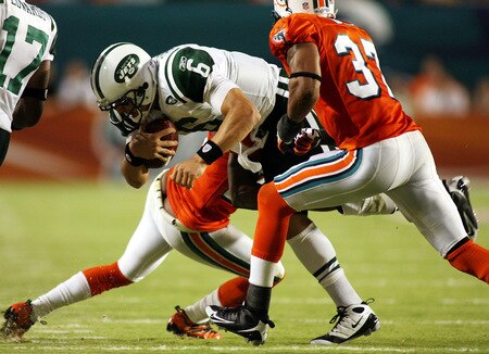 MIAMI - OCTOBER 12:  Quarterback Mark Sanchez #6 of the New York Jets scrambles against the Miami Dolphins at Land Shark Stadium on October 12, 2009 in Miami, Florida.  <br /><br /><span class="help">(Photo by Marc Serota/Getty Images)</span>