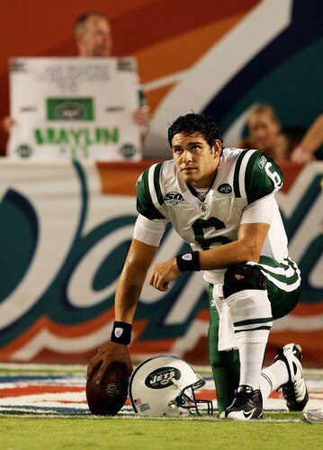 MIAMI - OCTOBER 12:  Quarterback Mark Sanchez #6 of the New York Jets takes a moment on the field during pre-game warm-up before taking on the Miami Dolphins at Land Shark Stadium on October 12, 2009 in Miami, Florida.  <br /><br /><span class="help">(Photo by Doug Benc/Getty Images)</span>