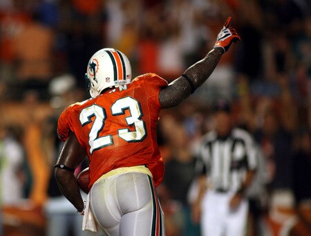 MIAMI - OCTOBER 12:  Running back Ronnie Brown #23 of the Miami Dolphins celebrates scoring the game winning touchdown against the New York Jets fans prior to their game at Land Shark Stadium on October 12, 2009 in Miami, Florida. Miami defeated New York 31-27.  <br /><br /><span class="help">(Photo by Marc Serota/Getty Images)</span>
