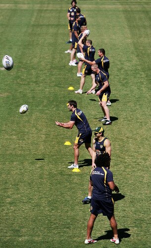 SYDNEY, AUSTRALIA - OCTOBER 13:  Kangaroos players run through some passing drills during an Australian Kangaroos training session at Concord Oval on October 13, 2009 in Sydney, Australia.  <br /><br /><span class="help">(Photo by Robert Gray/Getty Images)</span>