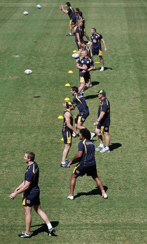 SYDNEY, AUSTRALIA - OCTOBER 13:  Kangaroos players run through some passing drills during an Australian Kangaroos training session at Concord Oval on October 13, 2009 in Sydney, Australia.  <br /><br /><span class="help">(Photo by Robert Gray/Getty Images)</span>