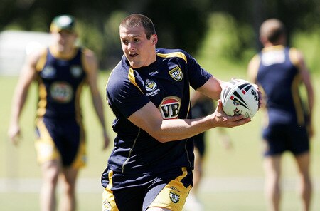 SYDNEY, AUSTRALIA - OCTOBER 13: Josh Morris passes the ball during an Australian Kangaroos training session at Concord Oval on October 13, 2009 in Sydney, Australia.  <br /><br /><span class="help">(Photo by Robert Gray/Getty Images)</span>