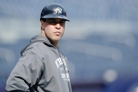 NEW YORK - OCTOBER 14:  Mark Teixeira #25 of the New York Yankees warms up during workouts on October 14, 2009 at Yankee Stadium in the Bronx borough of New York City.  <br /><br /><span class="help">(Photo by Jared Wickerham/Getty Images)</span>