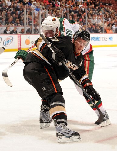 ANAHEIM, CA - OCTOBER 14:  Saku Koivu #11 of the Anaheim Ducks wins a faceoff from Mikko Koivu #9 of the Minnesota Wild during the second period at the Honda Center on October 14, 2009 in Anaheim, California.  <br /><br /><span class="help">(Photo by Harry How/Getty Images)</span>