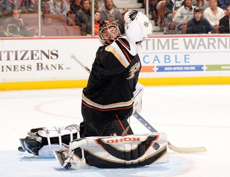 ANAHEIM, CA - OCTOBER 14:  Jonas HIller #1 of the Anaheim Ducks looks back for the puck after a shot from Eric Belanger #25 of the Minnesota Wild to score a goal during the second period at the Honda Center on October 14, 2009 in Anaheim, California.  <br /><br /><span class="help">(Photo by Harry How/Getty Images)</span>