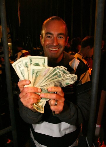 DAVIDSON, NC - OCTOBER 14:  NASCAR driver Marcos Ambrose shows money raised after he was locked up for charity at the NASCAR Second Annual Jail & Bail held at Brickhouse Tavern  October 14, 2009 in Davidson, North Carolina.  Funds raised during the event will go to The NASCAR Foundation and Brienne Davis Scholarship Fund.  <br /><br /><span class="help">(Photo by Jason Smith/Getty Images)</span>