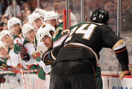 ANAHEIM, CA - OCTOBER 14:  Shane Hnidy #34 of the Minnesota Wild gets into a fight with Evgeny Artyukhin #24 of the Anaheim Ducks during the first period at the Honda Center on October 14, 2009 in Anaheim, California.  <br /><br /><span class="help">(Photo by Harry How/Getty Images)</span>