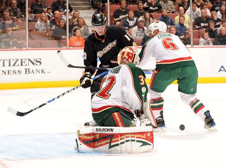 ANAHEIM, CA - OCTOBER 14:  Corey Perry #10 of the Anaheim Ducks looks for a rebound in front of Greg Zanon #6 and Niklas Backstrom #32 of the Minnesota Wild during the first period at the Honda Center on October 14, 2009 in Anaheim, California.  <br /><br /><span class="help">(Photo by Harry How/Getty Images)</span>