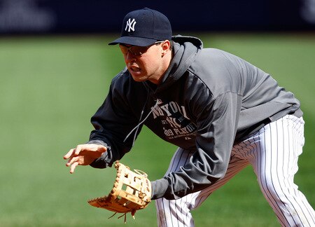 NEW YORK - OCTOBER 14:  Mark Teixeira #25 of the New York Yankees fields a ground ball during workouts on October 14, 2009 at Yankee Stadium in the Bronx borough of New York City.  <br /><br /><span class="help">(Photo by Jared Wickerham/Getty Images)</span>