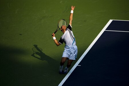 SHANGHAI, CHINA - OCTOBER 15:  Nikolay Davydenko of Russia serves to Fernando Gonzalez of Chile during day five of 2009 Shanghai ATP Masters 1000 at Qi Zhong Tennis Centre on October 15, 2009 in Shanghai, China.  <br /><br /><span class="help">(Photo by Victor Fraile/Getty Images)</span>