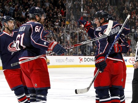 COLUMBUS, OH - OCTOBER 13:  Anton Stralman #6 of the Columbus Blue Jackets celebrates his second period goal with Rick Nash #61 of the Calgary Flames on October 13, 2009 at Nationwide Arena in Columbus, Ohio.  <br /><br /><span class="help">(Photo by Gregory Shamus/Getty Images)</span>