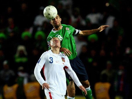 PRAGUE, CZECH REPUBLIC - OCTOBER 14:  Adam Hlousek (botton) of Czech Republic and Aaron Hughes of Northern Ireland jump for a header during the FIFA 2010 World Cup Group 3 Qualifier match between Czech Republic and Northern Ireland at the Synot Tip Arena on October 14, 2009 in Prague, Czech Republic.  <br /><br /><span class="help">(Photo by Alexander Hassenstein/Getty Images)</span>