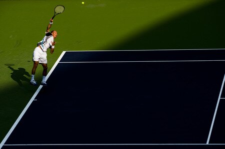 SHANGHAI, CHINA - OCTOBER 15:  Nikolay Davydenko of Russia serves to Fernando Gonzalez of Chile during day five of 2009 Shanghai ATP Masters 1000 at Qi Zhong Tennis Centre on October 15, 2009 in Shanghai, China.  <br /><br /><span class="help">(Photo by Victor Fraile/Getty Images)</span>