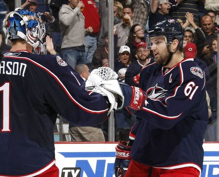 COLUMBUS, OH - OCTOBER 13:  Rick Nash #61 of the Columbus Blue Jackets celebrates a 2-1 victory over the the Calgary Flames with Steve Mason #1 on October 13, 2009 at Nationwide Arena in Columbus, Ohio. Columbus won the game 2-1.  <br /><br /><span class="help">(Photo by Gregory Shamus/Getty Images)</span>