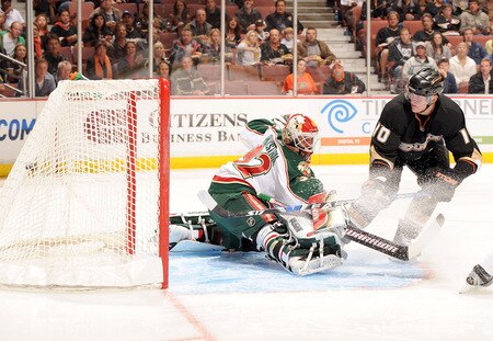 ANAHEIM, CA - OCTOBER 14:  Corey Perry #10 of the Anaheim Ducks scores a goal on a backhand past Niklas Backstrom #32 of the Minnesota Wild for a 1-0 lead during the first period at the Honda Center on October 14, 2009 in Anaheim, California.  <br /><br /><span class="help">(Photo by Harry How/Getty Images)</span>