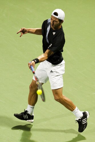 SHANGHAI, CHINA - OCTOBER 15:  Jurgen Melzer of Austria returns a ball to Feliciano Lopez of Spain during day five of 2009 Shanghai ATP Masters 1000 at Qi Zhong Tennis Centre on October 15, 2009 in Shanghai, China.  <br /><br /><span class="help">(Photo by Victor Fraile/Getty Images)</span>