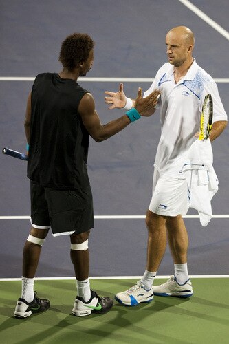 SHANGHAI, CHINA - OCTOBER 15:  Gael Monfils of France congratulates Ivan Ljubicic of Croatia after retiring from the match during day five of 2009 Shanghai ATP Masters 1000 at Qi Zhong Tennis Centre on October 15, 2009 in Shanghai, China.  <br /><br /><span class="help">(Photo by Victor Fraile/Getty Images)</span>
