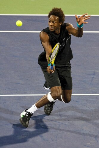 SHANGHAI, CHINA - OCTOBER 15:  Gael Monfils of France returns a ball to Ivan Ljubicic of Croatia during day five of 2009 Shanghai ATP Masters 1000 at Qi Zhong Tennis Centre on October 15, 2009 in Shanghai, China.  <br /><br /><span class="help">(Photo by Victor Fraile/Getty Images)</span>