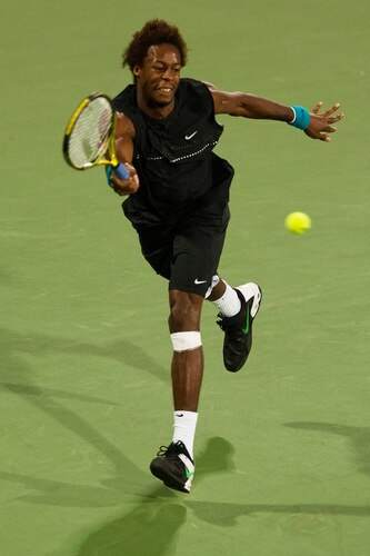 SHANGHAI, CHINA - OCTOBER 15: Gael Monfils of France returns a ball to Ivan Ljubicic of Croatia during day five of 2009 Shanghai ATP Masters 1000 at Qi Zhong Tennis Centre on October 15, 2009 in Shanghai, China.  <br /><br /><span class="help">(Photo by Victor Fraile/Getty Images)</span>