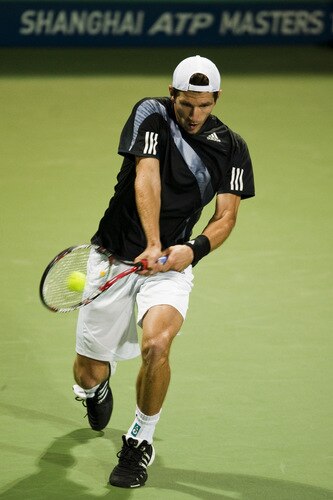 SHANGHAI, CHINA - OCTOBER 15: Jurgen Melzer of Austria returns a ball to Feliciano Lopez of Spain during day five of 2009 Shanghai ATP Masters 1000 at Qi Zhong Tennis Centre on October 15, 2009 in Shanghai, China.  <br /><br /><span class="help">(Photo by Victor Fraile/Getty Images)</span>