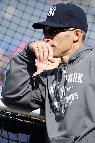 NEW YORK - OCTOBER 14:  Manager Joe Girargi of the New York Yankees watches players during workouts on October 14, 2009 at Yankee Stadium in the Bronx borough of New York City.  <br /><br /><span class="help">(Photo by Jared Wickerham/Getty Images)</span>