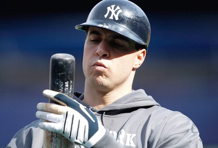 NEW YORK - OCTOBER 14:  Mark Teixeira #25 of the New York Yankees checks out his bat before entering the batting cage during workouts  on October 14, 2009 at Yankee Stadium in the Bronx borough of New York City.  <br /><br /><span class="help">(Photo by Jared Wickerham/Getty Images)</span>