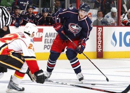 COLUMBUS, OH - OCTOBER 13:  Derick Brassard #16 of the Columbus Blue Jackets looks to get a shot off past Daymond Langkow #22 of the Calgary Flames on October 13, 2009 at Nationwide Arena in Columbus, Ohio.  <br /><br /><span class="help">(Photo by Gregory Shamus/Getty Images)</span>