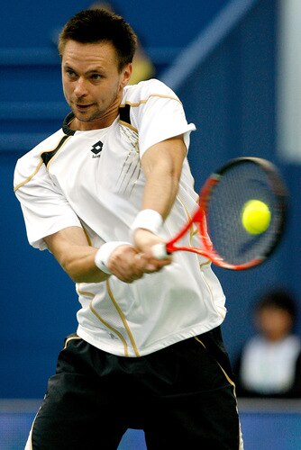 SHANGHAI, CHINA - OCTOBER 15:  Robin Soderling of Sweden returns a shot to Jo-Wilfried Tsonga of France during day five of the 2009 Shanghai ATP Masters 1000 at Qi Zhong Tennis Centre on October 15, 2009 in Shanghai, China.  <br /><br /><span class="help">(Photo by Matthew Stockman/Getty Images)</span>