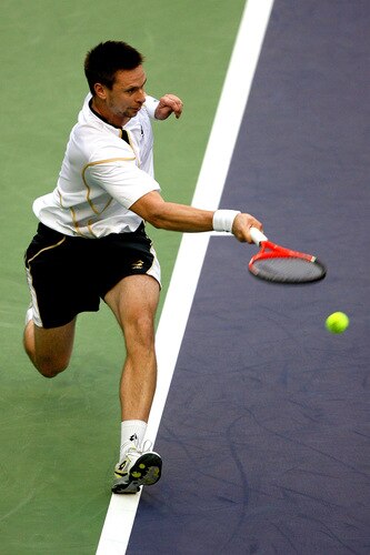 SHANGHAI, CHINA - OCTOBER 15:  Robin Soderling of Sweden returns a shot to Jo-Wilfried Tsonga of France during day five of the 2009 Shanghai ATP Masters 1000 at Qi Zhong Tennis Centre on October 15, 2009 in Shanghai, China.  <br /><br /><span class="help">(Photo by Matthew Stockman/Getty Images)</span>
