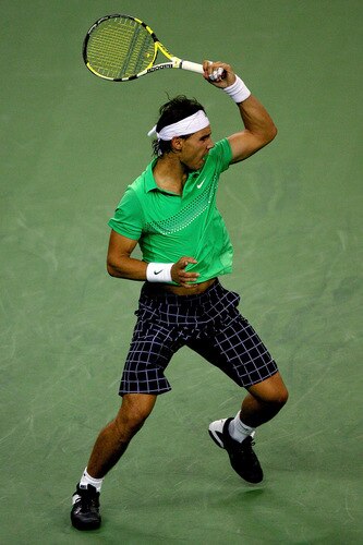 SHANGHAI, CHINA - OCTOBER 15:  Rafael Nadal of Spain returns a shot to Tommy Robredo of Spain during day five of the 2009 Shanghai ATP Masters 1000 at Qi Zhong Tennis Centre on October 15, 2009 in Shanghai, China.  <br /><br /><span class="help">(Photo by Matthew Stockman/Getty Images)</span>