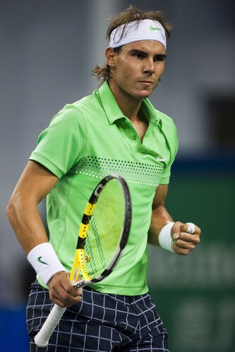 SHANGHAI, CHINA - OCTOBER 15:  Rafael Nadal of Spain celebrates a point against his compatriot Tommy Robredo during day five of 2009 Shanghai ATP Masters 1000 at Qi Zhong Tennis Centre on October 15, 2009 in Shanghai, China.  <br /><br /><span class="help">(Photo by Victor Fraile/Getty Images)</span>