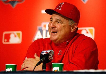 NEW YORK - OCTOBER 15:  Manager Mike Scioscia of the Los Angeles Angels of Anaheim talks to the media during workouts on October 15, 2009 at Yankee Stadium in the Bronx borough of New York City.  <br /><br /><span class="help">(Photo by Jared Wickerham/Getty Images)</span>