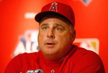 NEW YORK - OCTOBER 15:  Manager Mike Scioscia of the Los Angeles Angels of Anaheim talks to the media during workouts on October 15, 2009 at Yankee Stadium in the Bronx borough of New York City.  <br /><br /><span class="help">(Photo by Jared Wickerham/Getty Images)</span>