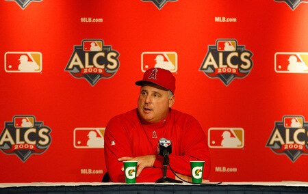 NEW YORK - OCTOBER 15:  Manager Mike Scioscia of the Los Angeles Angels of Anaheim talks to the media during workouts on October 15, 2009 at Yankee Stadium in the Bronx borough of New York City.  <br /><br /><span class="help">(Photo by Jared Wickerham/Getty Images)</span>