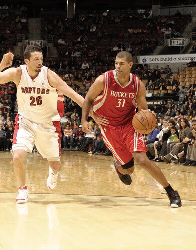 TORONTO - OCTOBER 15:  Shane Battier #31 of the Houston Rockets tries to get past his man, Hedo Turkoglu #26 of the Toronto Raptors during a game on October 15, 2009 at the Air Canada Centre in Toronto, Ontario, Canada.  <br /><br /><span class="help">(Photo by Ron Turenne/NBAE via Getty Images)</span>